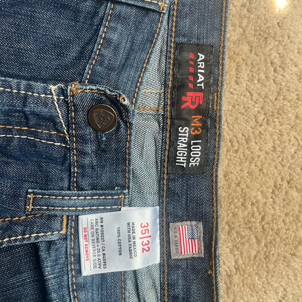 2 pairs Ariat 35/32 FR Jeans like new